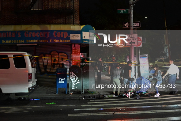 Five people are being injured in a stabbing attack as a result of a dispute at 100th Street and 37th Avenue in Queens, New York, United Stat...