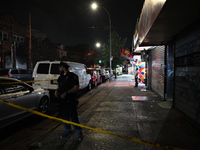 Five people are being injured in a stabbing attack as a result of a dispute at 100th Street and 37th Avenue in Queens, New York, United Stat...