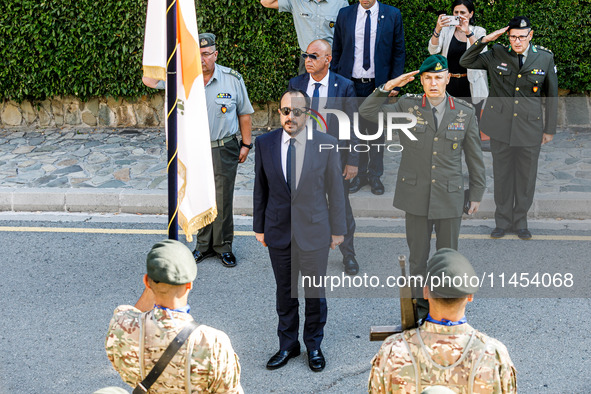 President of Cyprus Nikos Christodoulides is singing during the play of the national anthem in Kykkos, Cyprus, on August 4, 2024. President...