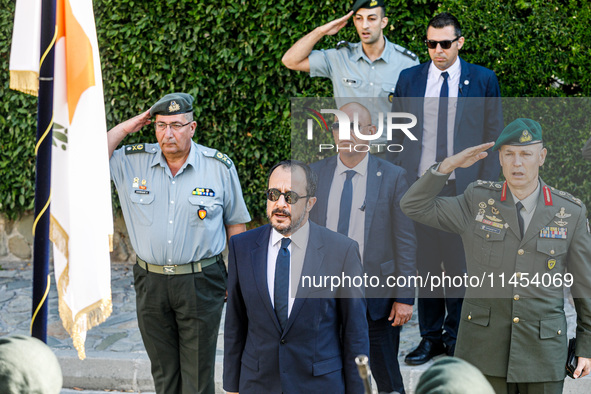 President of Cyprus Nikos Christodoulides is singing during the play of the national anthem in Kykkos, Cyprus, on August 4, 2024. President...