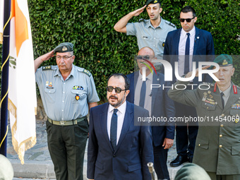 President of Cyprus Nikos Christodoulides is singing during the play of the national anthem in Kykkos, Cyprus, on August 4, 2024. President...