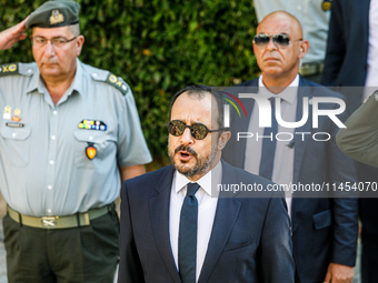 President of Cyprus Nikos Christodoulides is singing during the play of the national anthem in Kykkos, Cyprus, on August 4, 2024. President...