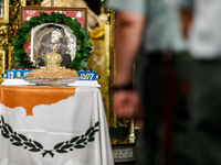 A photograph of Makarios is being seen on a table with the flag of Cyprus during the service in Kykkos, Cyprus, on August 4, 2024. The Presi...