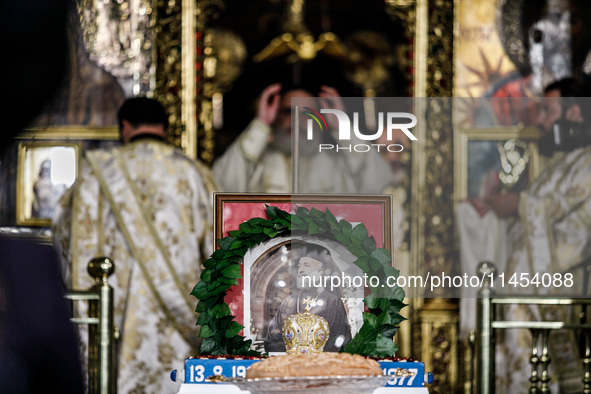 A photograph of Makarios is being seen during the service in Kykkos, Cyprus, on August 4, 2024. President of Cyprus Nikos Christodoulides is...