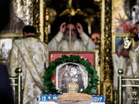 A photograph of Makarios is being seen during the service in Kykkos, Cyprus, on August 4, 2024. President of Cyprus Nikos Christodoulides is...