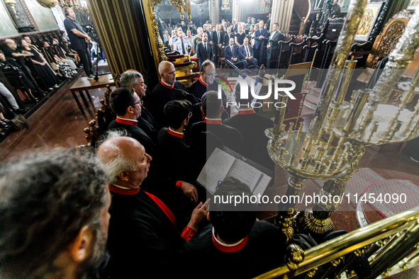 Chanters are being seen during the service in Kykkos, Cyprus, on August 4, 2024. President of Cyprus Nikos Christodoulides is attending the...