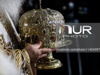 Archbishop Georgios of Cyprus is holding a golden crown during the service in Kykkos, Cyprus, on August 4, 2024. President of Cyprus Nikos C...