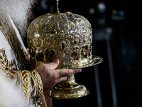 Archbishop Georgios of Cyprus is holding a golden crown during the service in Kykkos, Cyprus, on August 4, 2024. President of Cyprus Nikos C...