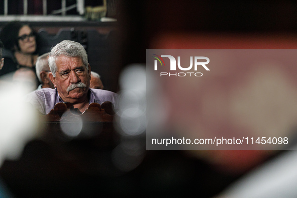 A man is being seen during the service in Kykkos, Cyprus, on August 4, 2024. President of Cyprus Nikos Christodoulides is attending the memo...