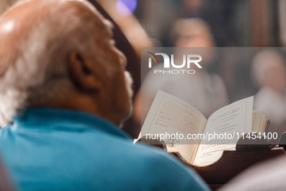 An open ecclesiastical book is being seen during the service in Kykkos, Cyprus, on August 4, 2024. President of Cyprus Nikos Christodoulides...