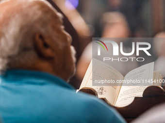 An open ecclesiastical book is being seen during the service in Kykkos, Cyprus, on August 4, 2024. President of Cyprus Nikos Christodoulides...