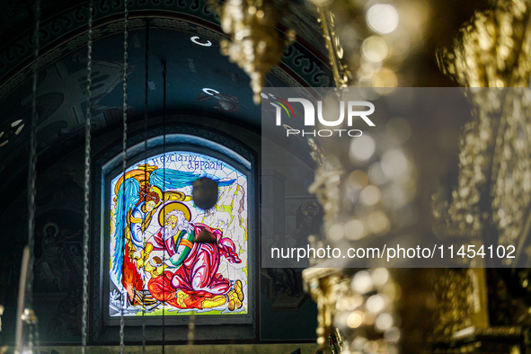 A stained glass window is being seen inside the church of the monastery in Kykkos, Cyprus, on August 4, 2024. President of Cyprus Nikos Chri...