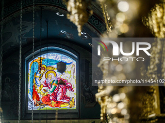 A stained glass window is being seen inside the church of the monastery in Kykkos, Cyprus, on August 4, 2024. President of Cyprus Nikos Chri...