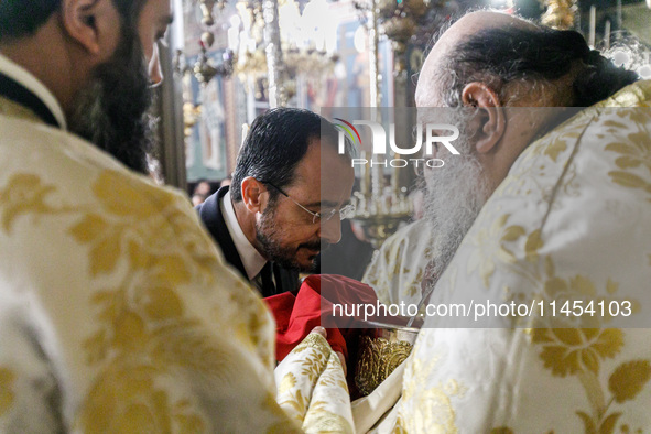 President of Cyprus Nikos Christodoulides is about to get the Holy Communion in Kykkos, Cyprus, on August 4, 2024. President of Cyprus Nikos...