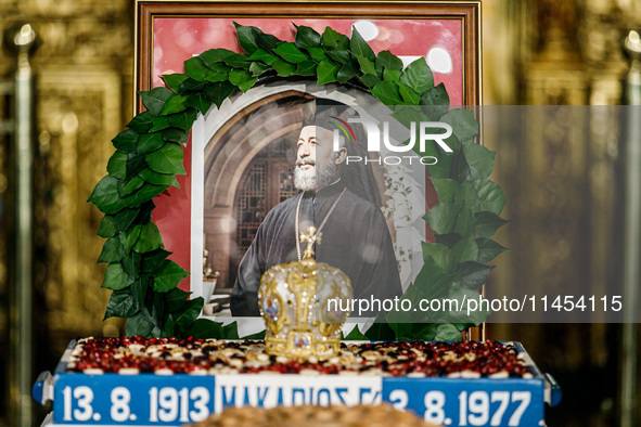 A photograph of Makarios is being seen during the service in Kykkos, Cyprus, on August 4, 2024. President of Cyprus Nikos Christodoulides is...