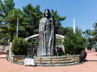 Two soldiers are standing in front of the Makarios statue in Kykkos, Cyprus, on August 4, 2024. The President of Cyprus, Nikos Christodoulid...