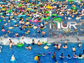 People are enjoying the cool water at a water park in Nanjing, China, on August 4, 2024. (