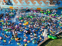 People are enjoying the cool water at a water park in Nanjing, China, on August 4, 2024. (