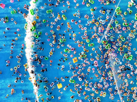 People are enjoying the cool water at a water park in Nanjing, China, on August 4, 2024. (