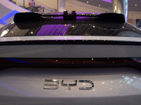 The BYD logo is being seen as 70 models from auto dealers like Tesla, Audi, Hongqi, SAIC Volkswagen, and Jiyue Nio are on display during the...