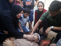 (EDITOR'S NOTE: Graphic content) Palestinians are mourning a member of their family in the aftermath of a reported overnight Israeli strike...