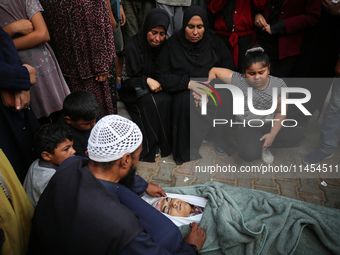 (EDITOR'S NOTE: Graphic content) Palestinians are mourning a member of their family in the aftermath of a reported overnight Israeli strike...