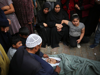 (EDITOR'S NOTE: Graphic content) Palestinians are mourning a member of their family in the aftermath of a reported overnight Israeli strike...