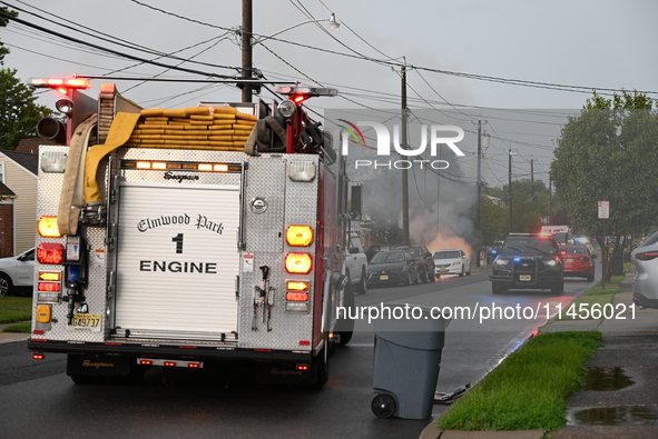 Northeast summer thunderstorms are causing havoc when lightning strikes wires, causing them to fall and a car to catch fire, prompting a mas...