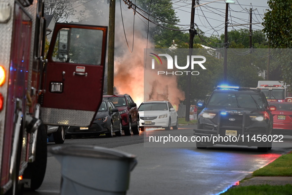 Northeast summer thunderstorms are causing havoc when lightning strikes wires, causing them to fall and a car to catch fire, prompting a mas...