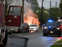 Northeast summer thunderstorms are causing havoc when lightning strikes wires, causing them to fall and a car to catch fire, prompting a mas...