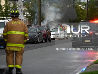 Northeast summer thunderstorms are causing havoc when lightning strikes wires, causing them to fall and a car to catch fire, prompting a mas...