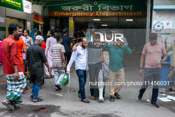 People Carried Injured Protesters To Dhaka Medical College Emergency Unit After A Clash On The First Day Of The One-point Movement Designed...