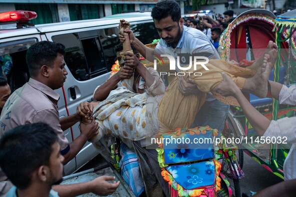 People Carried Injured Protesters To Dhaka Medical College Emergency Unit After A Clash On The First Day Of The One-point Movement Designed...