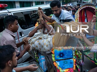 People Carried Injured Protesters To Dhaka Medical College Emergency Unit After A Clash On The First Day Of The One-point Movement Designed...