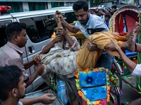 People Carried Injured Protesters To Dhaka Medical College Emergency Unit After A Clash On The First Day Of The One-point Movement Designed...