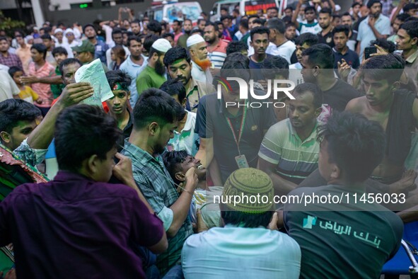 People Carried Injured Protesters To Dhaka Medical College Emergency Unit After A Clash On The First Day Of The One-point Movement Designed...