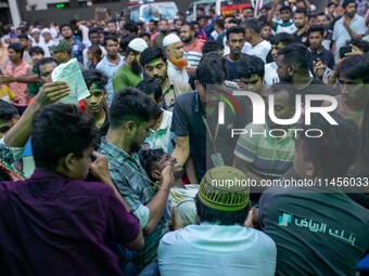 People Carried Injured Protesters To Dhaka Medical College Emergency Unit After A Clash On The First Day Of The One-point Movement Designed...