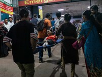 People Carried Injured Protesters To Dhaka Medical College Emergency Unit After A Clash On The First Day Of The One-point Movement Designed...