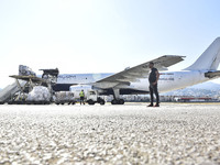 The Minister of Public Health in the caretaker government, Dr. Firas Al-Abyad, is receiving an emergency aid shipment via charter plane in B...