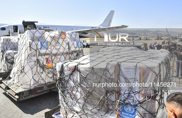 The Minister of Public Health in the caretaker government, Dr. Firas Al-Abyad, is receiving an emergency aid shipment via charter plane in B...