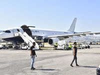 The Minister of Public Health in the caretaker government, Dr. Firas Al-Abyad, is receiving an emergency aid shipment via charter plane in B...