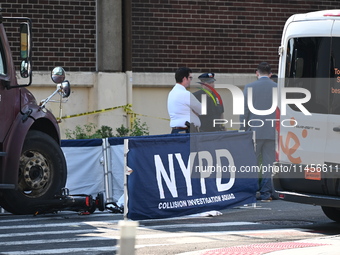 An unidentified male is riding a two-wheel device and is struck and killed by a white box truck in Queens, New York, United States, on Augus...