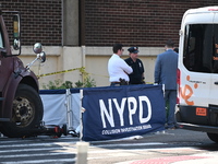 An unidentified male is riding a two-wheel device and is struck and killed by a white box truck in Queens, New York, United States, on Augus...