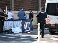 An unidentified male is riding a two-wheel device and is struck and killed by a white box truck in Queens, New York, United States, on Augus...