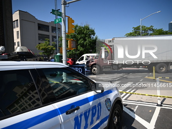 An unidentified male is riding a two-wheel device and is struck and killed by a white box truck in Queens, New York, United States, on Augus...