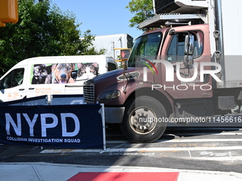 An unidentified male is riding a two-wheel device and is struck and killed by a white box truck in Queens, New York, United States, on Augus...