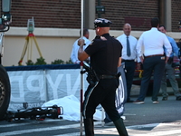 An unidentified male is riding a two-wheel device and is struck and killed by a white box truck in Queens, New York, United States, on Augus...