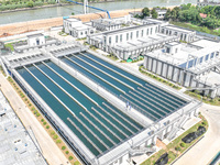 Workers are inspecting various water supply equipment at Qinghong Water Plant in Qianyuan town, Deqing County, Huzhou city, Zhejiang provinc...