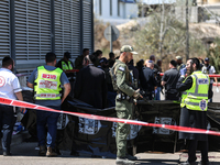 Israeli first responders are working at the site of a stabbing at the checkpoint outside of Jerusalem, Israel, on August 6, 2024, following...