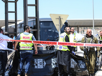 Israeli first responders are working at the site of a stabbing at the checkpoint outside of Jerusalem, Israel, on August 6, 2024, following...